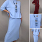 Elegantes 2-teiliges Set aus Strickpullover und Midirock